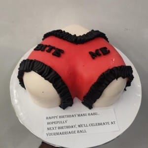 Naughty 3D butt shape cake with red lingerie and "Bite Me" text. Funny custom bachelor party cake delivery in Hyderabad, Banjara Hills, and Jubilee Hills.