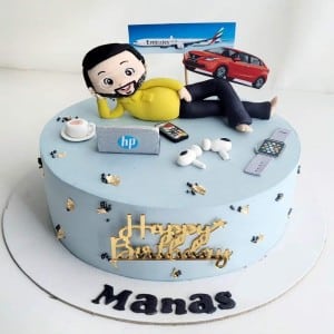 Powder blue birthday cake for men with 3D relaxing man caricature, edible laptop, gadgets, car, and airplane. Custom techie cake delivery in Hyderabad, Hitech City, and Madhapur.