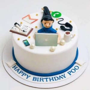 Work from home theme birthday cake with 3D man on laptop, Gmail and WhatsApp icons, headphones, and coffee. Custom techie cake delivery in Hyderabad, Hitech City, and Gachibowli.